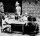 Japan / China: Chinese 'Comfort Women' formerly in the service of the Imperial Japanese Army being interviewed by Chinese soldiers watched by an American officer, c. 1945